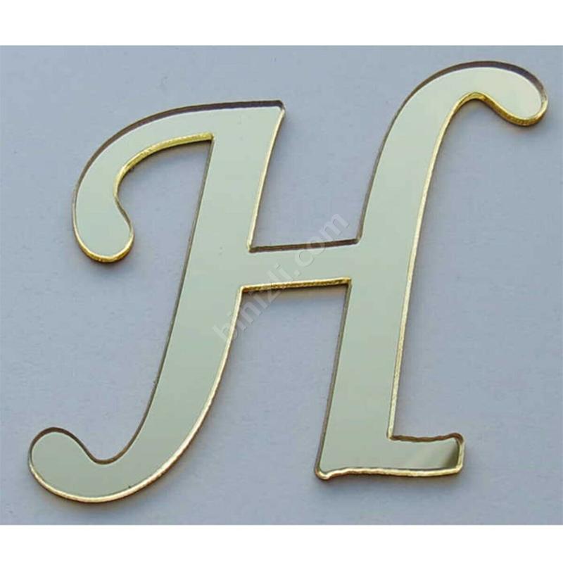 H harfi (altın renk)